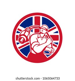 Icon retro style illustration of a British cable installer guy holding RCA plug cable with United Kingdom UK, Great Britain Union Jack flag set inside circle on isolated background.
