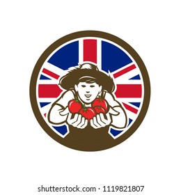 Icon retro style illustration of a British organic grown produce tomato farmer with United Kingdom UK, Great Britain Union Jack flag set inside circle on isolated background.