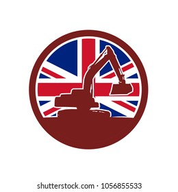 Icon retro style illustration of silhouette of a British mechanical digger or excavator viewed from side with United Kingdom UK, Great Britain Union Jack flag set inside circle on isolated background.