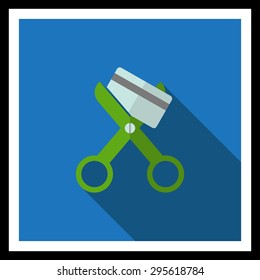 Icon of scissors cutting credit card