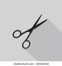 icon. Scissors and paper on a gray background