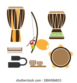 Icon set of Afro brazilian musical instruments used in capoeira and samba music. Isolated atabaque, berimbau, djembe, tambourine, bell and other ethnic instrument pictures in flat style.