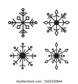 Icon Set black and white with naif simple and plane design of four snowflakes.
