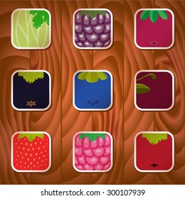 Icon set with a different berries on a wood background.
