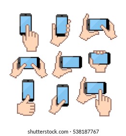 Icon set of hands holding smartphone. Flat pixel vector icons.