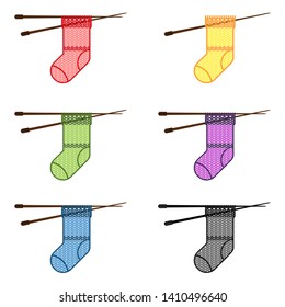 icon set of knitted socks of different colors. vector illustration