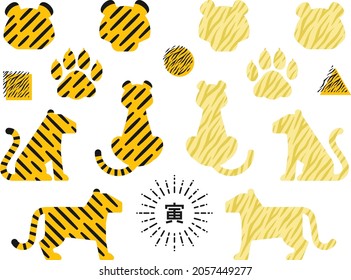 Icon Set Of Tiger Face And Body Shape With Tiger Pattern
The Kanji Written In The Center Means A Tiger.