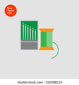 Icon of sewing spool of green thread and needle set
