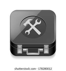 Icon of shiny black tool box on white background