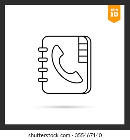 Icon of telephone book with telephone receiver on cover