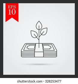 Icon of tree growing on banknote stack