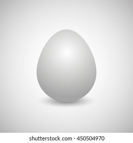 Icon white egg isolated on a gray background, vertically disposed with shadow, vector illustration.