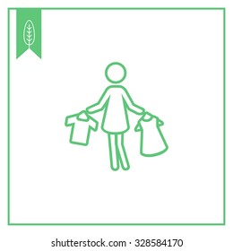 Icon of woman silhouette holding clothes on hangers