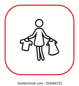 Icon of woman silhouette holding clothes on hangers