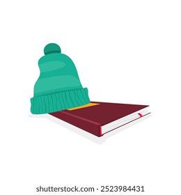 Icon of a woolen hat on a book