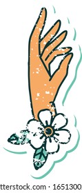 iconic distressed sticker tattoo style image of a hand and flower