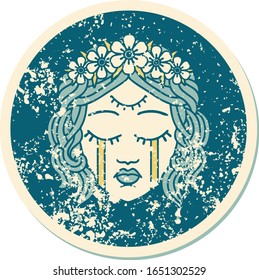 iconic distressed sticker tattoo style image of female face with third eye and crown of flowers cyring