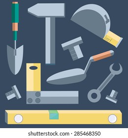 Icons of building materials. Shovel, level, putty knife, wrench, hammer into a flat style on gray background. Logo design elements. Vector illustration