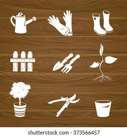 icons garden tools on a wood background. vector illustration