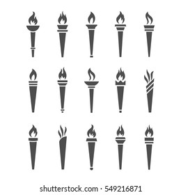 Icons torch with flame isolated vector set. The symbol of victory, success or achievement. Silhouettes of various medieval flaming torches.