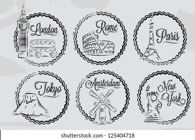 Icons with world cities London, New York, Rome, Amsterdam, Tokyo, Paris, stylized drawing with coal on grey background.