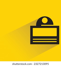 id card badge with shadow on yellow background