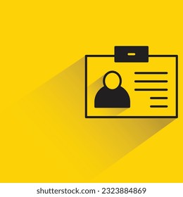 id card with shadow on yellow background