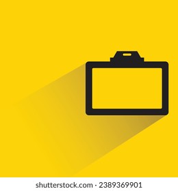 id card with shadow on yellow background