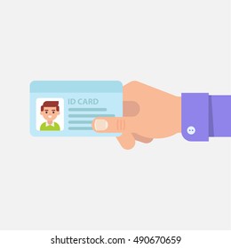 ID or identity card in male hand isolated vector illustration in flat style. Man's hand holding or showing ID badge or driving license. Presenting business cards. 