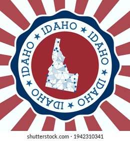 Idaho Badge. Round logo of US state with triangular mesh map and radial rays. EPS10 Vector.