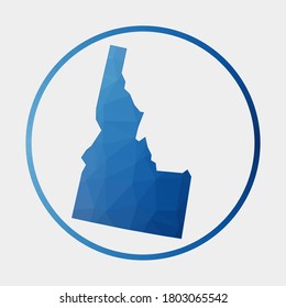 Idaho icon. Polygonal map of the US state in gradient ring. Round low poly Idaho sign. Vector illustration.