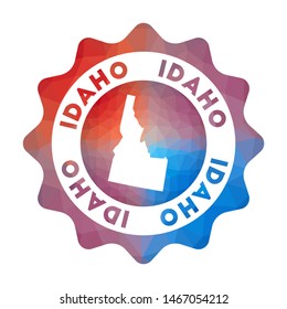 Idaho low poly logo. Colorful gradient travel logo of the US state in geometric style. Multicolored polygonal Idaho rounded sign with map for your infographics.