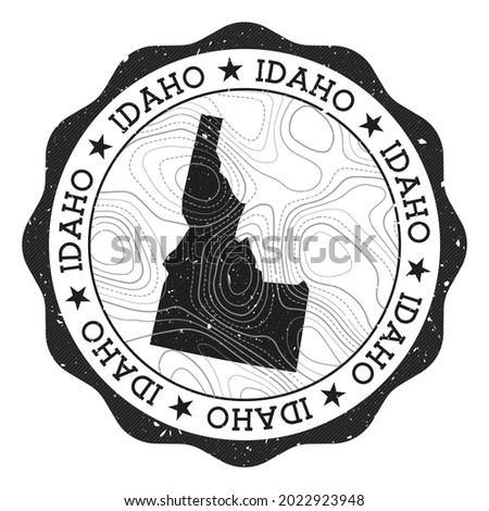 Idaho outdoor stamp. Round sticker with map of US state with topographic isolines. Vector illustration. Can be used as insignia, logotype, label, sticker or badge of Idaho.