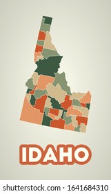 Idaho poster in retro style. Map of the US state with regions in autumn color palette. Shape of Idaho with US state name. Appealing vector illustration.