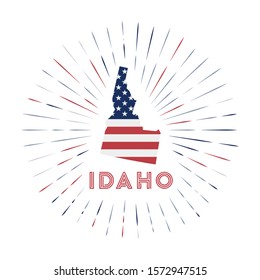 Idaho sunburst badge. The us state sign with map of Idaho with American flag. Colorful rays around the logo. Vector illustration.