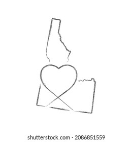Idaho US state hand drawn pencil sketch outline map with heart shape. Continuous line drawing of patriotic home sign. A love for a small homeland. T-shirt print idea. Vector illustration.