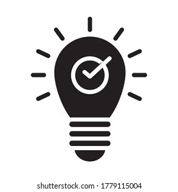idea bulb light with check mark icon over white background, silhouette style, vector illustration