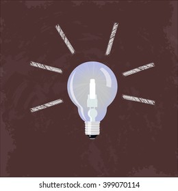Idea concept. Light bulb on red blackboard with draw chalk rays. Brainstorm concept.  Thinking process. 
