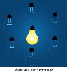 idea concept with light bulbs on a blue background