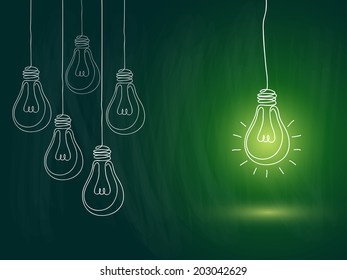 idea concept with light bulbs on blackboard background