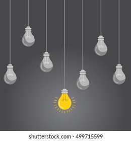 idea concept with light bulbs on a grey background.