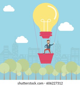 Idea concept with lightbulb airballon and businessman in blue skies.