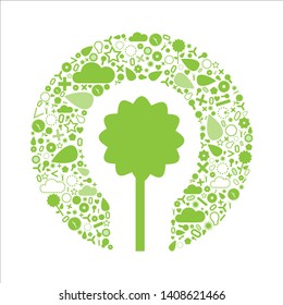 Idea of environmental friendly concept. Green flower inside light bulb and element background.