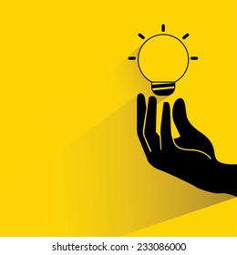 idea, hand holding light bulb on yellow background, flat and shadow theme