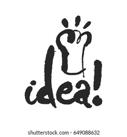 Idea. Hand written phrase in calligraphic style. Black on white background. Clipping paths included.
