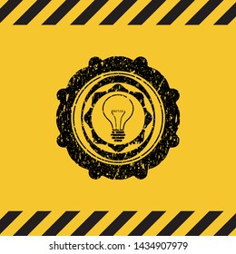 idea icon black grunge emblem inside yellow warning sign. Vector Illustration. Detailed.