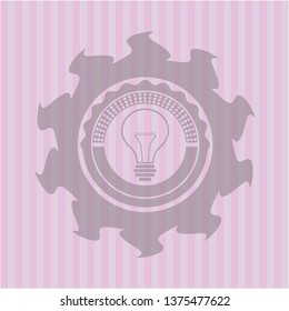 idea icon inside badge with pink background