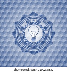 idea icon inside blue badge with geometric pattern background.