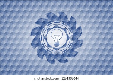 idea icon inside blue badge with geometric pattern.