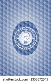 idea icon inside blue polygonal badge.